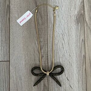 Betsey Johnson Gold Tone Necklace with Black Glitter Bow Pendant